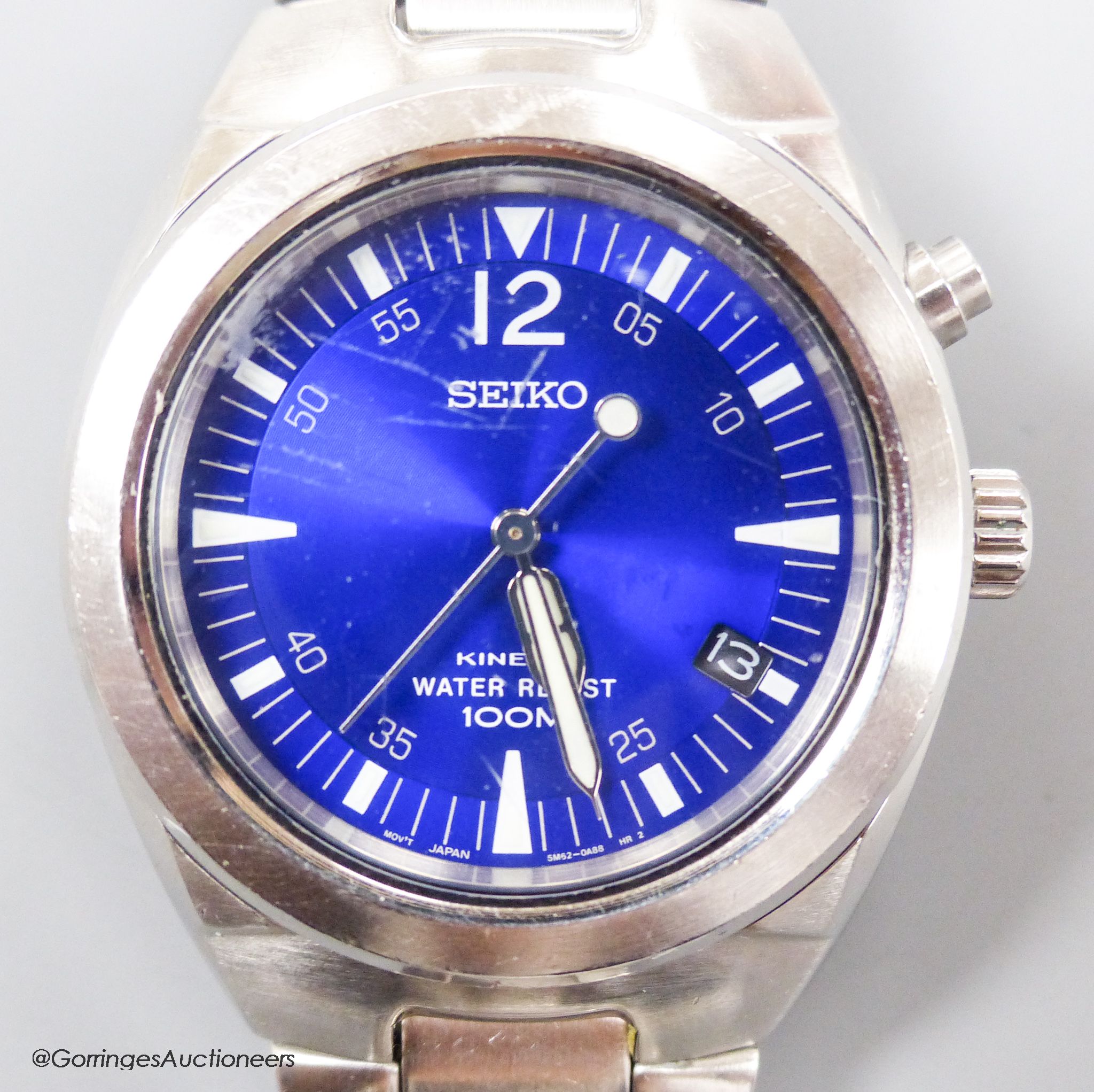 A gentleman's modern stainless steel Seiko Kinetic Waterproof 100M wrist watch, with blue dial, on stainless steel Seiko bracelet, case diameter 39mm excl. crown.